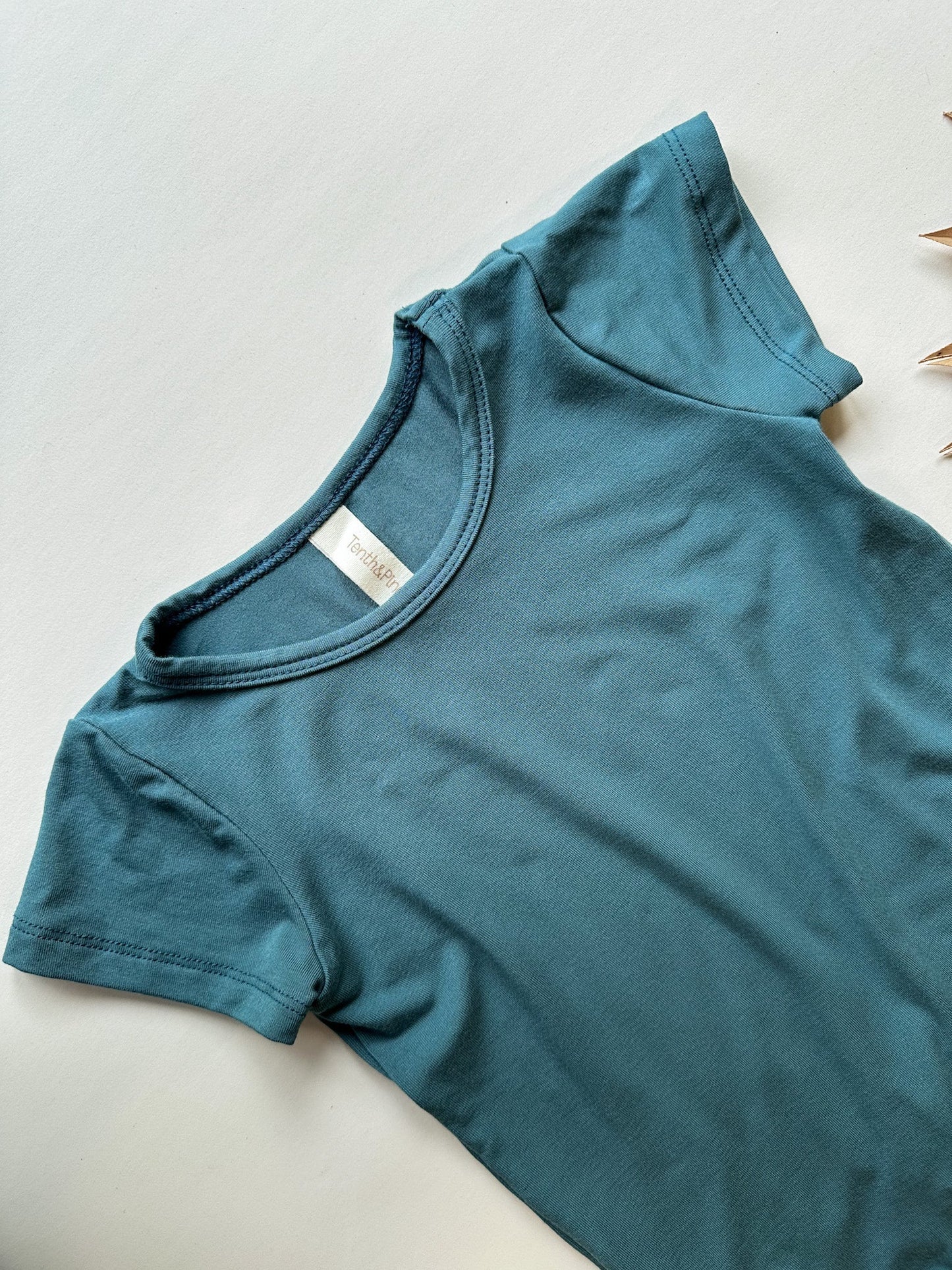 0/3m Short Sleeve Snap Romper | Dark Teal | Luxury Bamboo