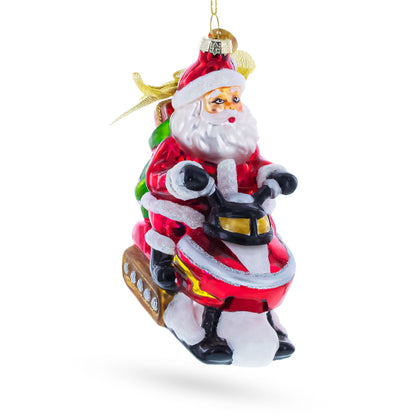 Santa on Snowmobile Glass Christmas Ornament