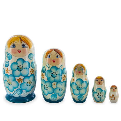 White Hood with Blue Flowers Wooden  Nesting Dolls